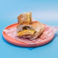 Ham Breakfast Sandwich* · ham, egg tortilla & swiss cheese served on brioche bread