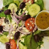 Greek Salad · Romaine, seasonal greens, tomatoes, feta, kalamata olives, cucumber, red onion, red wine vin...