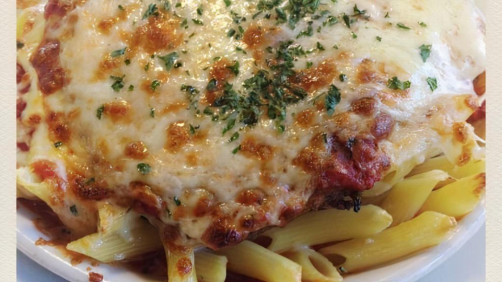 Parmigiana · Choice of milk-fed veal, house-made chicken cutlet or batter-dipped eggplant side of spaghetti with San Marzano tomato sauce.