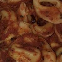 Tortellini · San Marzano tomato-basil sauce.