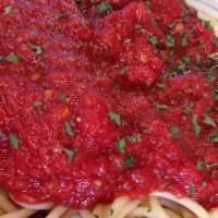 Spaghetti With Sausage · San Marzano tomato-basil sauce.