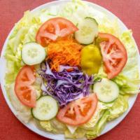 Garden · Lettuce, tomatoes, cucumbers, onions, green peppers shredded carrots and red cabbage.