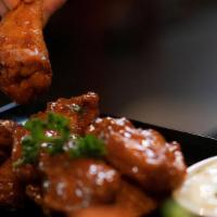 Plough Jumbo Wings · Fried Drumsticks & Wings in Homemade Buffalo sauce with Celery, Carrots & Blue Cheese Dressi...