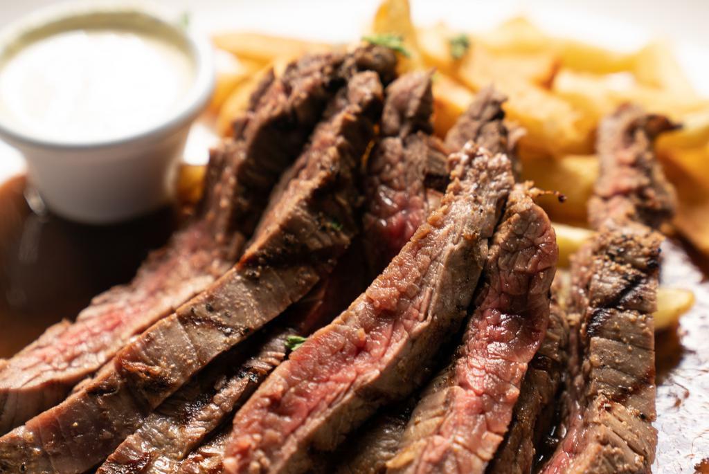 Plough Steak Fritte · Grilled & Sliced Marinated Flank Steak with a Red Wine au Jus, Fries & Horseradish Dipping Sauce