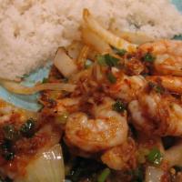 Shrimp Lemongrass Rice · Shrimp sautéed with lemongrass, onions, garlic, chili pepper, scallions; over rice.