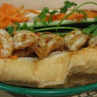 128 - Shrimp Hoagie · Grilled shrimp, butter, sauteed scallions, house sauce, pickled carrots, cucumber, jalapeno ...
