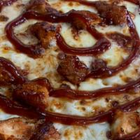 Bbq Chicken Pizza · Chicken, BBQ sauce, and mozzarella.