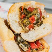 Veggie Sandwich · Breaded Eggplant, broccoli rabe, roasted peppers and sharp provolone.