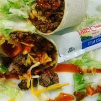 Taco Wrap · Beef, hot sauce, sour cream, lettuce, tomato and cheddar cheese