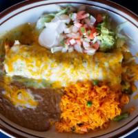 Chicken Burrito · Shredded chicken covered with out homemade green tomatillo sauce and melted cheese.