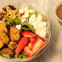 Mixed Green Salad · Spring mix greens, sliced strawberries, feta cheese, walnuts and house made croutons. Served...