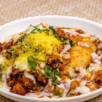 आलू टिक्की चाट करोल बाग वाली  Aloo Tikki Chaat Karol Bagh Wali · Spiced round potato cutlets topped with spiced chickpeas, yogurt, mint, cilantro sauce, and ...