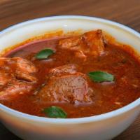 गोश्त कोरमा  Gosht Korma (Bone-In Baby Goat) · Goat cooked in chef's special spiced sauce made with yogurt. Served with basmati rice. Nut-f...