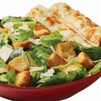 Caesar · Crisp lettuce, shaved parmesan cheese and croutons. Served with Caesar dressing. 420 cal.