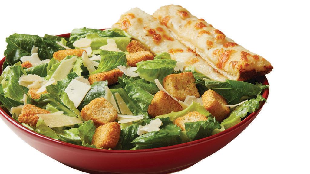 Caesar · Crisp lettuce, shaved parmesan cheese and croutons. Served with Caesar dressing. 420 cal.