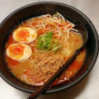 Miso Hot Ramen · Pork bone broth seasoned with red miso mix topped with seasoned ground pork, egg, bean sprou...