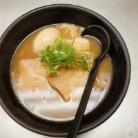 Rich Garlic Ramen · A mix of seafood and pork bone broth with fresh ground garlic, topped with bean sprouts, egg...