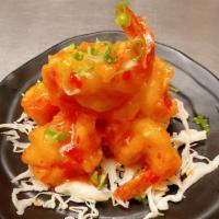 Bang Bang Shrimp · Crispy tempura fried shrimp tossed in sweet chili sauce.