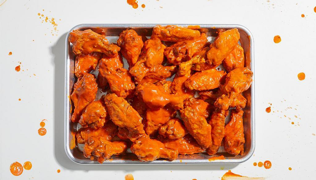 Bone-In Chicken Wings (100) · 100 bone-in chicken wings with your choice of sauce. Served with celery or carrots, and blue cheese or ranch.