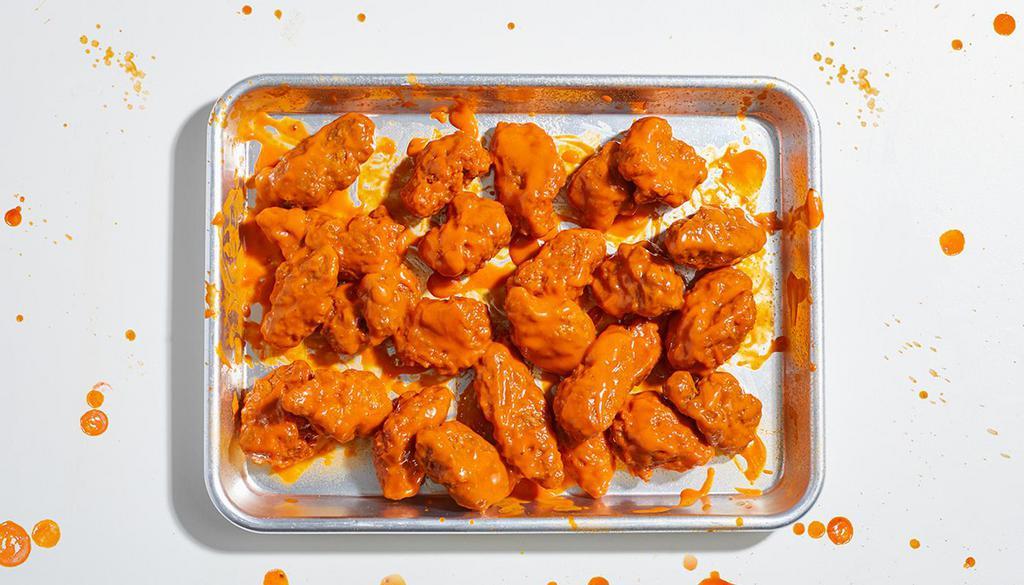 Boneless Chicken Wings (18) · 18 boneless wings with your choice of sauce. Served with celery or carrots, and blue cheese or ranch.