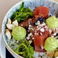 Tuna Poke Bowl · Large size of our tuna poke, ahi tuna, sticky rice, wakame, avocado mousse, wasabi ginger so...