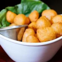 Cheddar Curds · Battered Wisconsin Cheddar Curds
Spicy Ranch Sauce