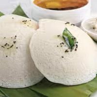 Idli · Idli tossed with ghee & houses special spices/Manchurian/curry leaf.