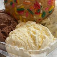 4 Scoop Sampler · 4 scoops of ice cream with a small cookie.