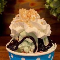Junior Sundae · 2 scoops of ice cream with 2 wet toppings, 1 dry topping, and a cherry.