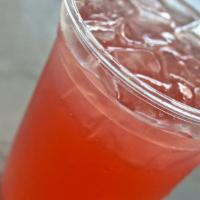 Raspberry Lime Rickey · Seltzer, raspberry syrup and lime juice poured over ice.