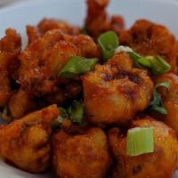 Gobi Manchuria · Vegetarian. Indian Chinese fried vegetables and cauliflower in a spicy brown sauce.