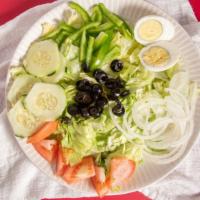 Garden Salad · Iceberg lettuce, tomato, onion, olive, cucumber, green peppers, and egg.