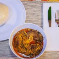 Egusi Soup With Goat Meat And Pounded Yam · 