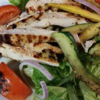 Grilled Chicken Salad · Grilled chicken and grilled vegetables over fresh greens. Served with our house dressing.