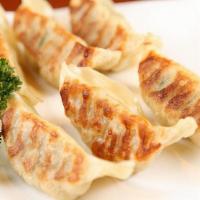 Pan Fried Gyoza · Pan-fried pork dumplings