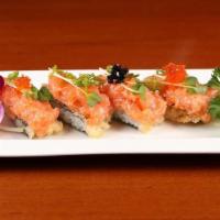 Spicy Salmon Tartar · Spicy salmon, green baby, tobiko, top on fried seaweed with rice