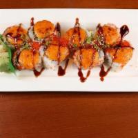 Sunny Roll · Crab sticks, avocado, cucumber and flying-fish roe topped with grilled spicy mayo and eel sa...