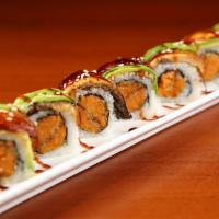 Super Dragon Roll · Eel and avocado on top of sweet potato tempura roll. Served with eel sauce