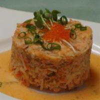 Grilled Salmon Salad · Grilled salmon, crab stick, flying-fish roe, spicy mayo and scallions served with special sa...