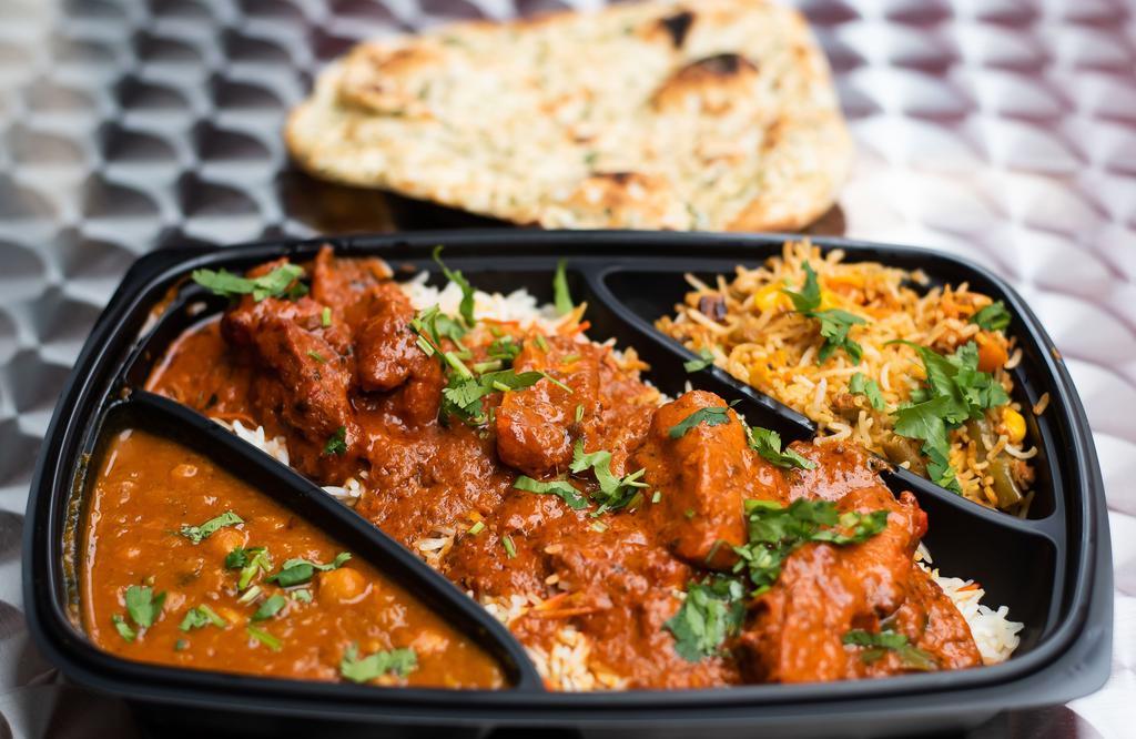 Butter Chicken (Signature Dish) · Rich and creamy blend of tomatoes, butter, curry and spices with mild meat.
