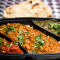 Channa Masala · Chickpeas with a blend of spices, onions, chillies and tomatoes.