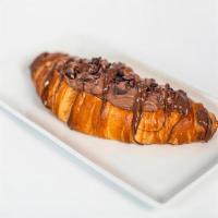 Cornetto - Nutella · A traditional Italian breakfast croissant! 

Nutella ricotta, powdered sugar, cocoa nibs