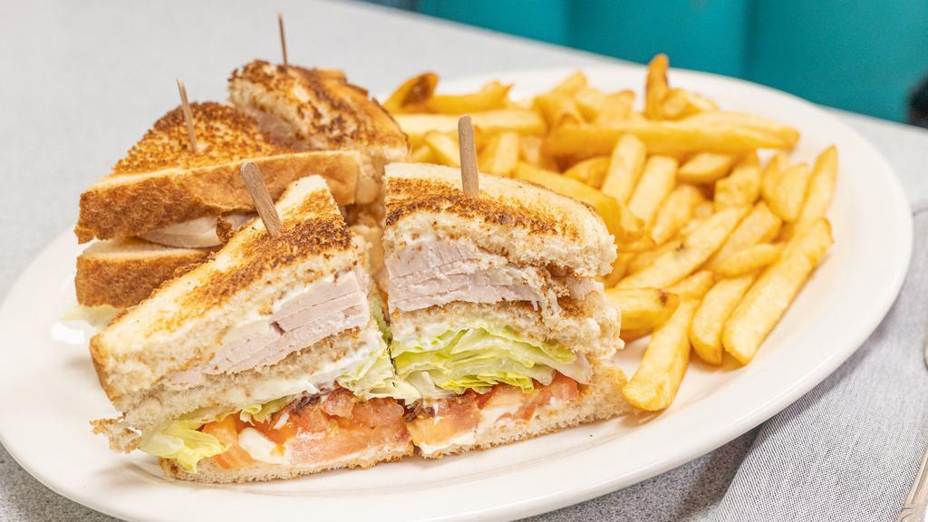 Sliced Turkey Club · 3 slices of bread and two layers of filling.