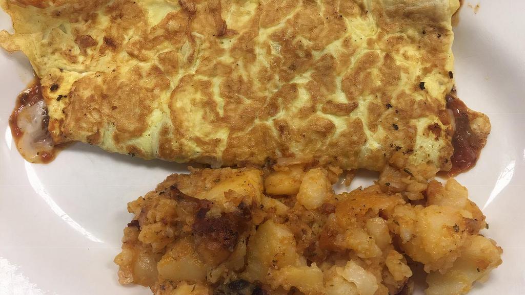 Spanish Omelet · *Consuming raw or undercooked meats, poultry, seafood, shellfish or eggs may increase your risk of foodborne illness.