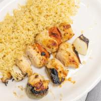 Broiled Chicken Kabob · Lamb and kabobs served with rice pilaf and salad.