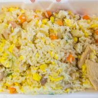 Young Chow Fried Rice · Chicken shrimp pork egg 
onions,  peas, and carrot fried rice