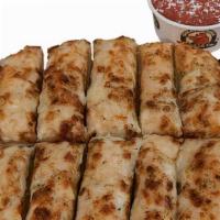 Italian Bread · 10 - piece Italian Bread cover with Mozzarella Cheese topped with Garlic Butter and Parmesan...