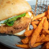 Fried Haddock Sandwich · Seasonal Item: Fried Haddock topped with lettuce, American cheese,  and tartar sauce and ser...