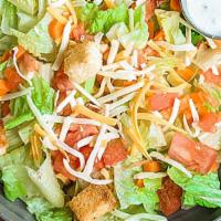 Tossed Salad · Fresh mixed greens and veggies tossed and served with your choice of dressing