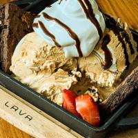 Brownie Sundae · A warm salted caramel brownie topped with a double scoop of vanilla ice cream.  Drizzled wit...